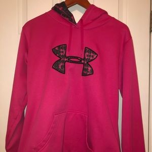 A pink UA hoodie